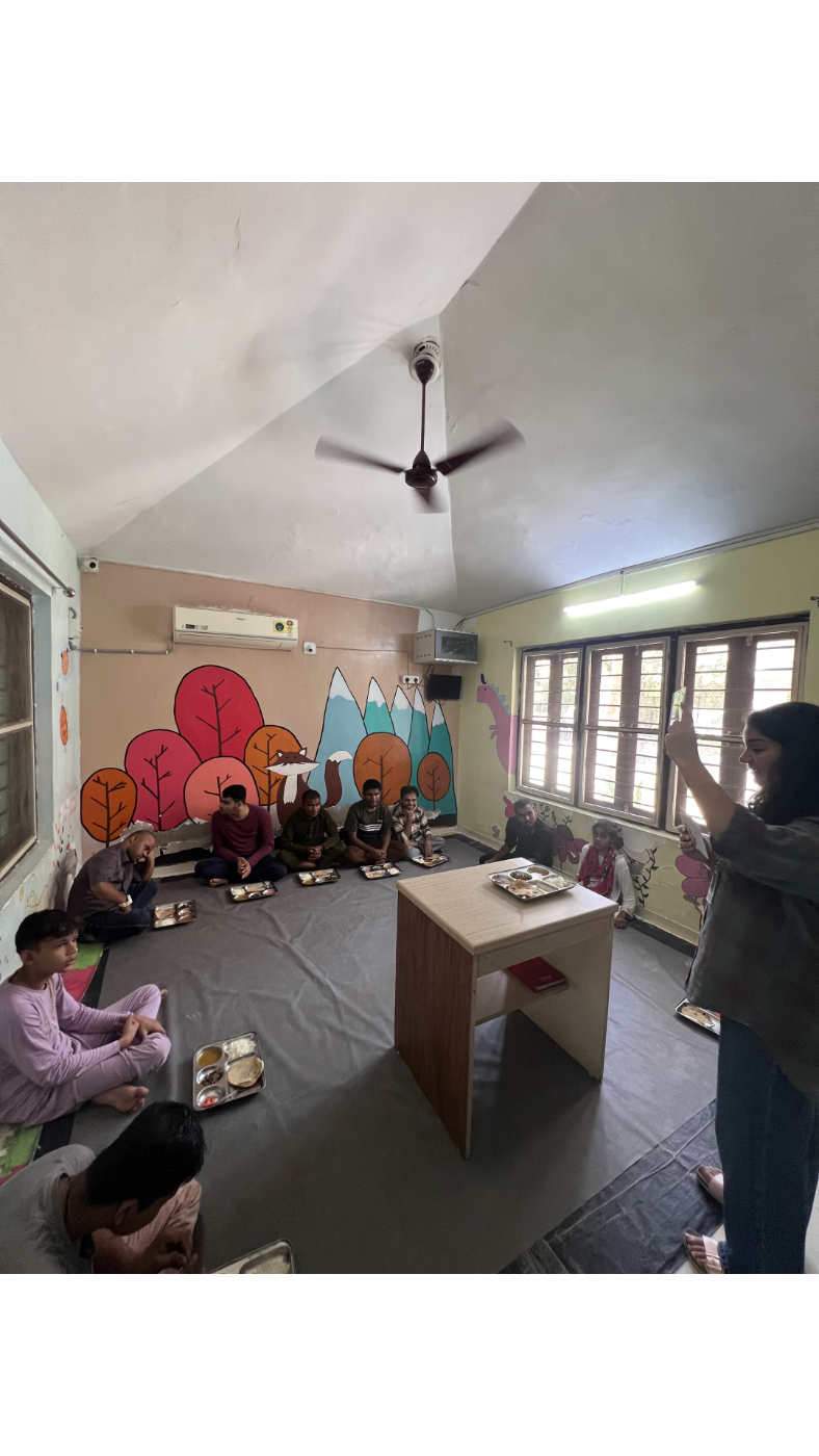 Life Skills Training — beneficiaries sharing a meal together