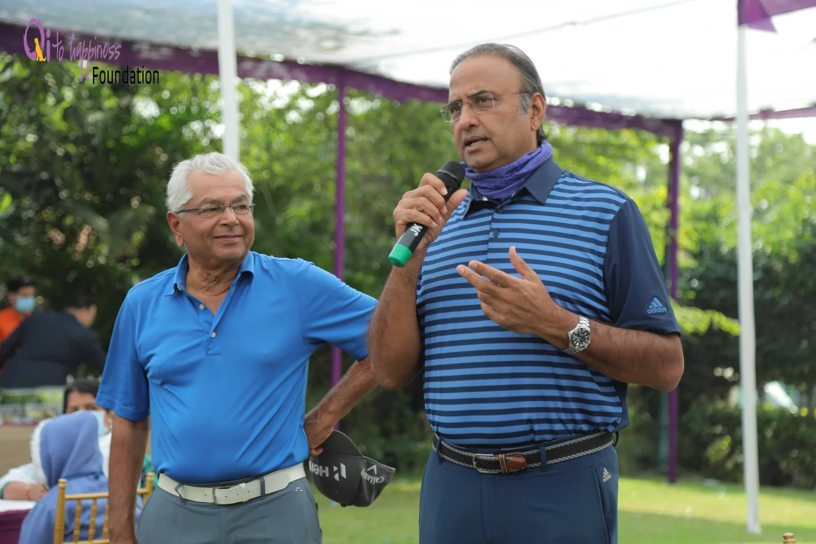 Mr. Charu Sharma hosting the charity auction